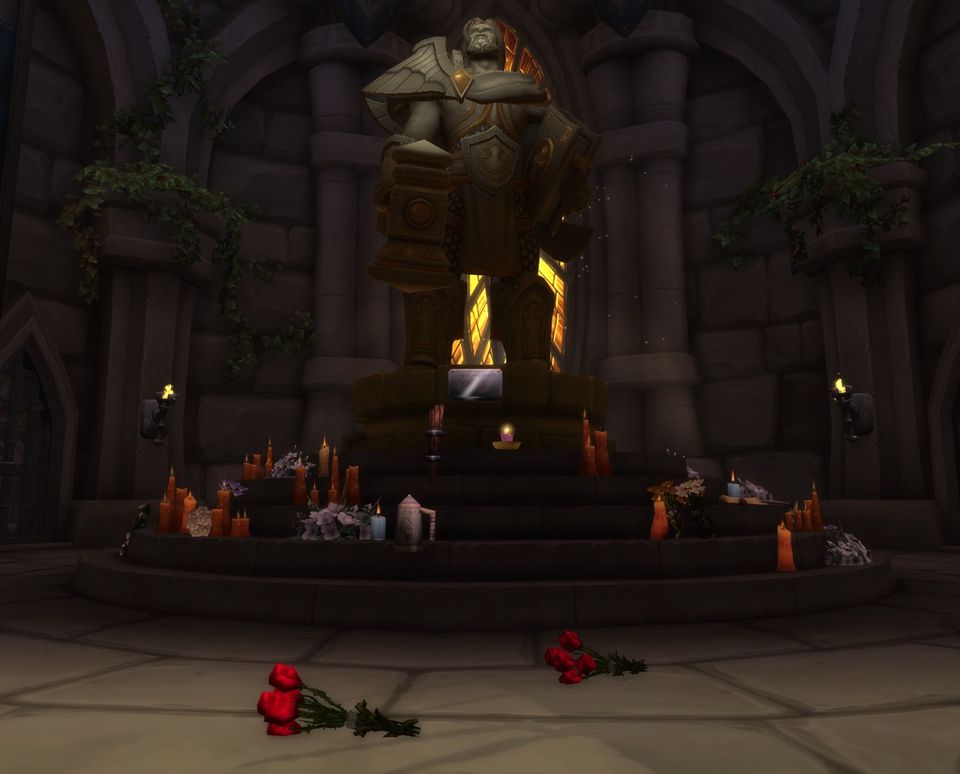Offerings at Uther's statue in the Western Plaguelands
